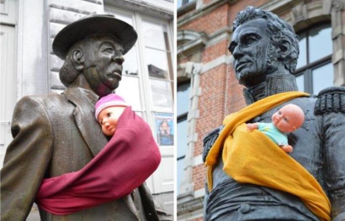 A Gand si celebra così la Giornata internazionale dell’uomo: alle statue viene regalata una fascia porta bebè (Gand)