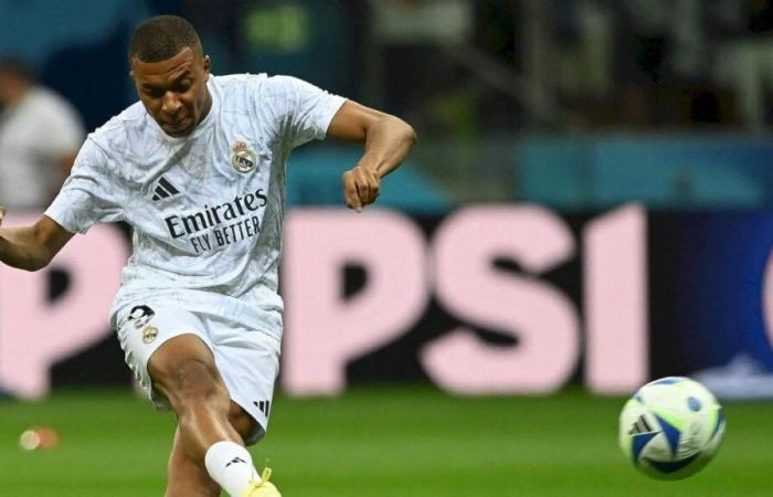 Luka Modrić difende Kylian Mbappé