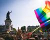 migliaia di persone marciano durante la marcia del Pride, Mila infarinata ed esfiltrata