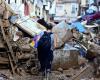 i corpi di due giovani fratelli ritrovati due settimane dopo l'alluvione